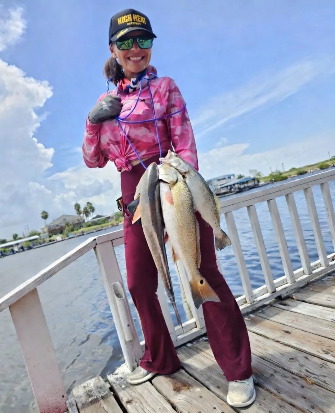Captain Eva on a waterfront dock in Port Mansfield with her catch
